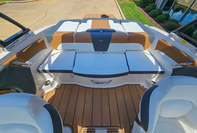 Slide: The Image of Interior of 2023 Chaparral 21 SSi with luxurious seating. - 14