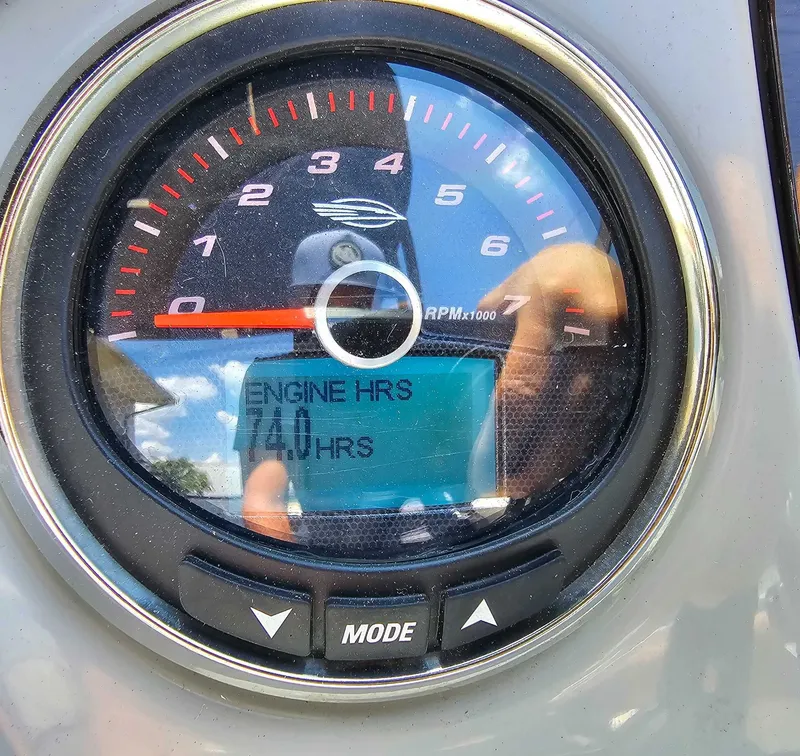 Slide: The Image of Chaparral 21 SSi 2023 tachometer showing 74 engine hours. - 16