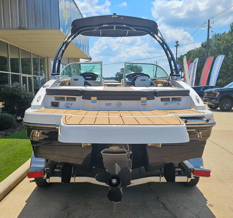 Slide: The Image of Rear view of 2023 Chaparral 21 SSi boat on a trailer. - 9