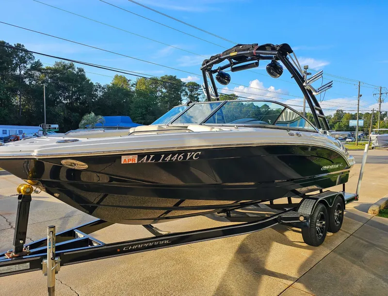 Slide: The Image of 2017 Chaparral 216 SSi boat on trailer in sunlight. - 5