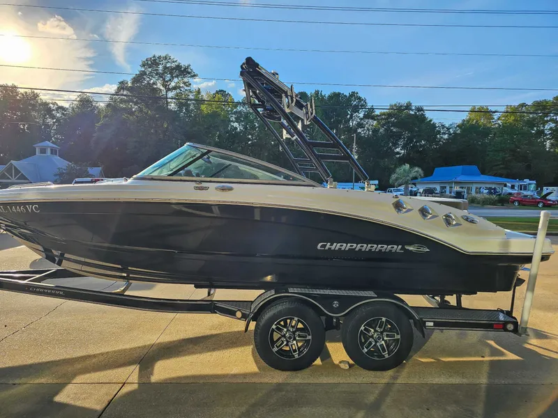 Slide: The Image of 2017 Chaparral 216 SSi boat on trailer at sunset. - 6