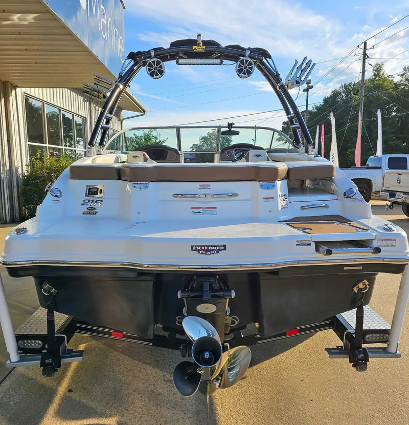 Slide: The Image of Rear view of a 2017 Chaparral 216 SSi boat on a trailer. - 9