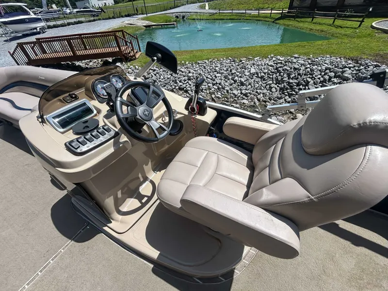 Slide: The Image of Interior view of a 2014 Sweetwater 200 Premium Edition boat. - 12