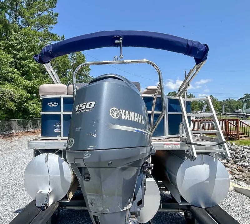 Slide: The Image of 2014 Sweetwater 200 Premium Edition pontoon boat with Yamaha 150 engine. - 7