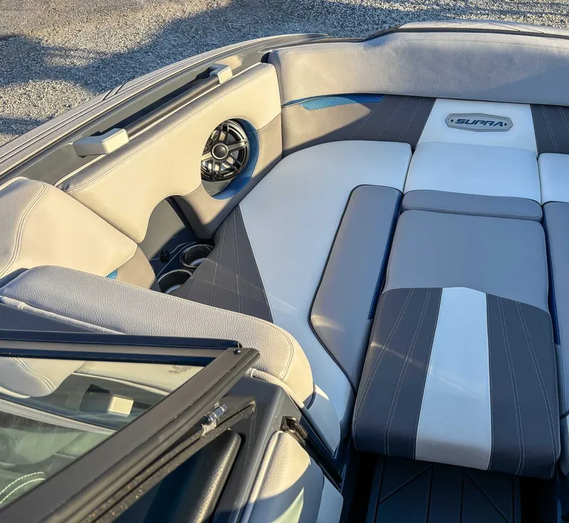 Slide: The Image of Interior of a 2020 Supra SA450 boat with luxurious upholstery. - 12