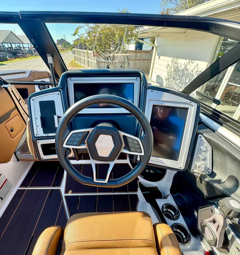 Slide: The Image of 2023 Supra SL interior with modern dashboard design. - 18