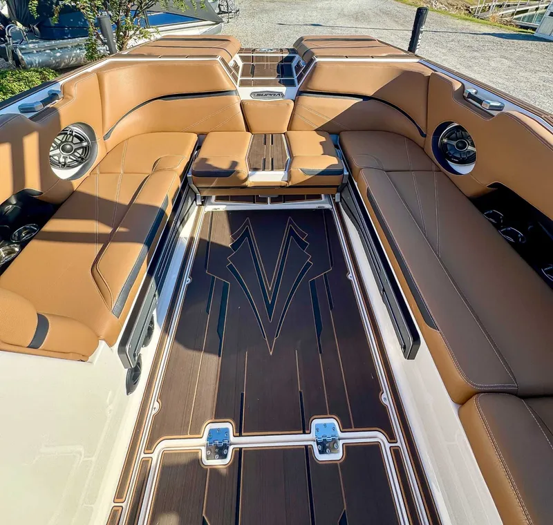 Slide: The Image of 2023 Supra SL interior with brown leather seating. - 20