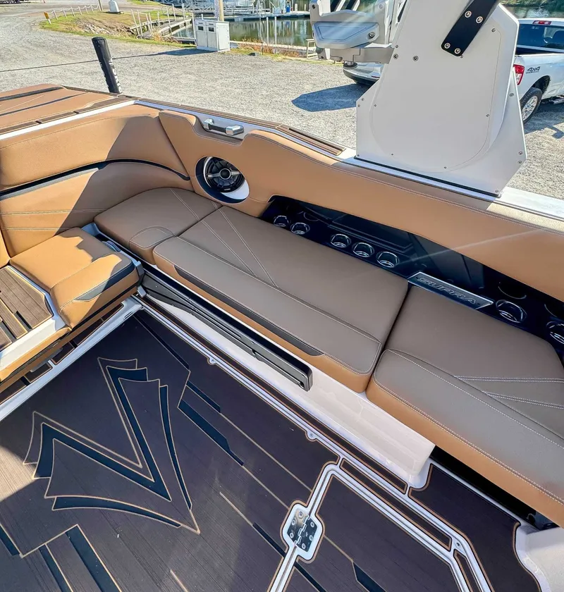 Slide: The Image of 2023 Supra SL interior with brown leather seating. - 21