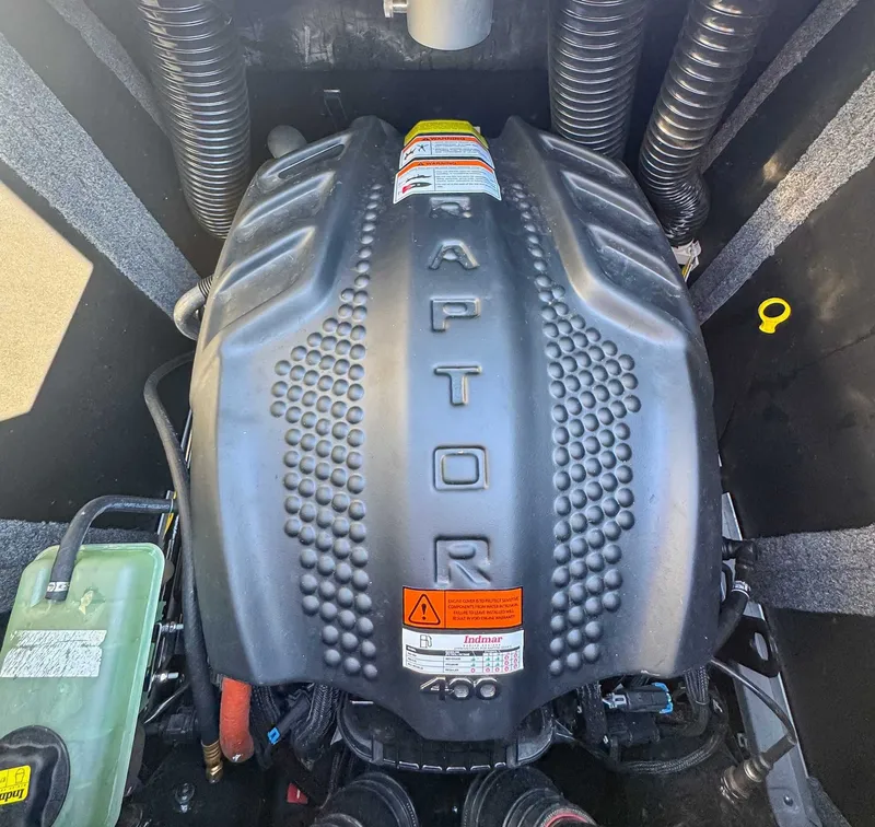 Slide: The Image of 2023 Supra SL engine cover with Raptor 400 branding. - 22