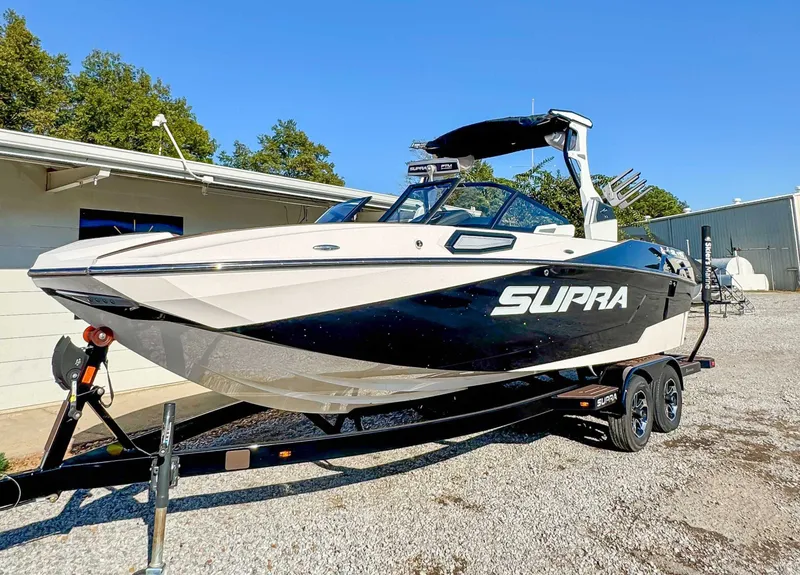 Slide: The Image of 2023 Supra SL boat on trailer, ready for adventure. - 3