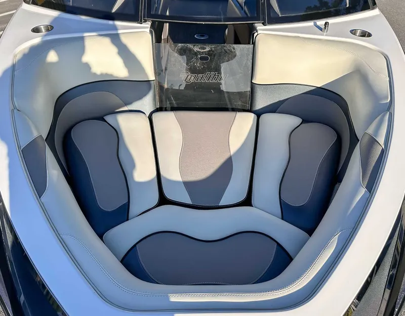 Slide: The Image of Interior of 2013 Malibu Wakesetter 20 VTX with cushioned seating. - 14