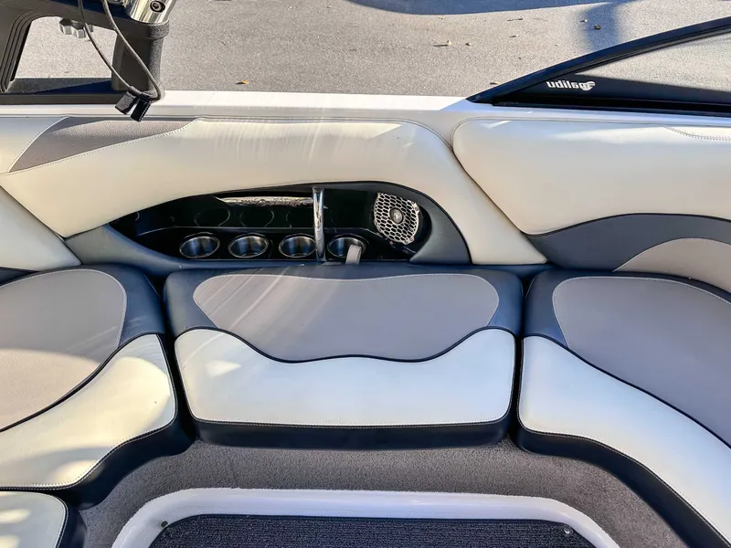 Slide: The Image of Interior of 2013 Malibu Wakesetter 20 VTX with seating and cup holders. - 22