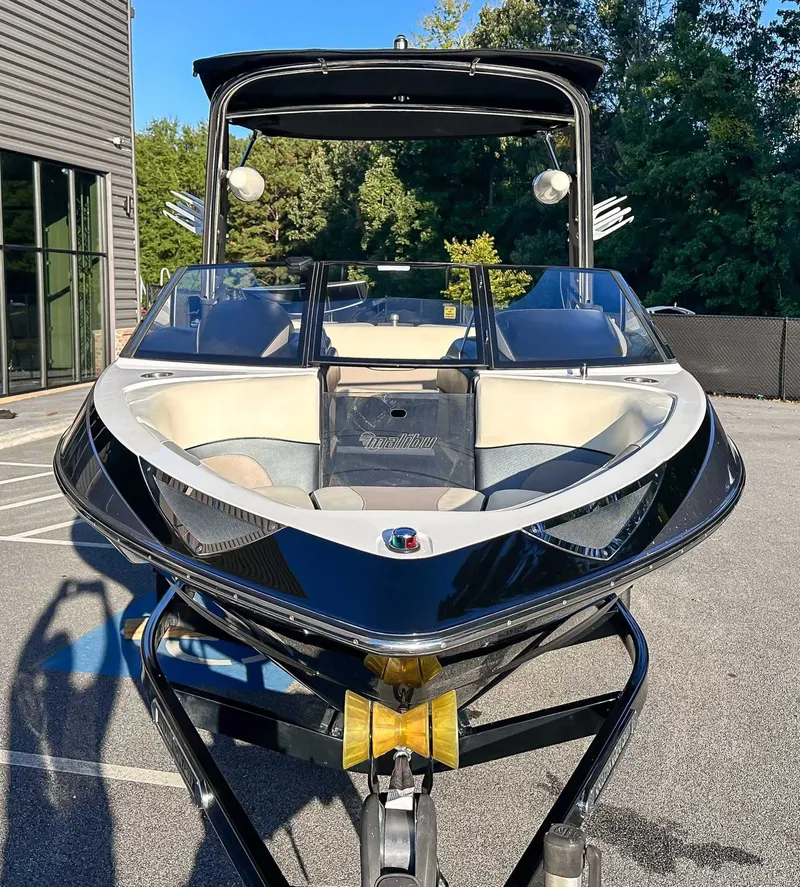 Slide: The Image of 2013 Malibu Wakesetter 20 VTX boat on trailer outdoors. - 4