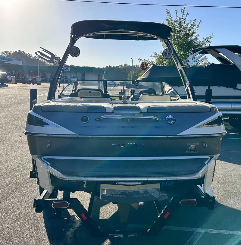 Slide: The Image of 2013 Malibu Wakesetter 20 VTX boat on trailer outdoors. - 8