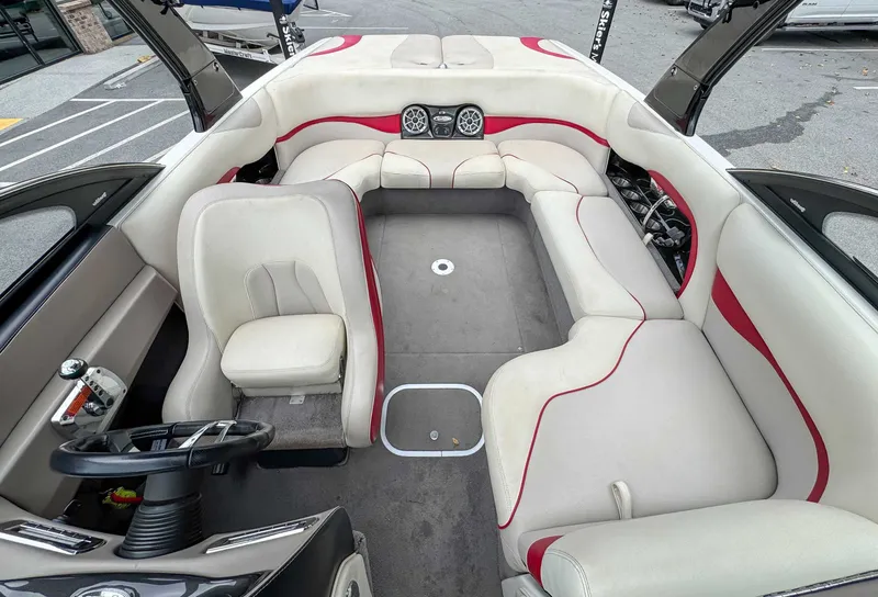 Slide: The Image of Interior of a 2008 Malibu Wakesetter 21 VLX boat with white and red seating. - 13