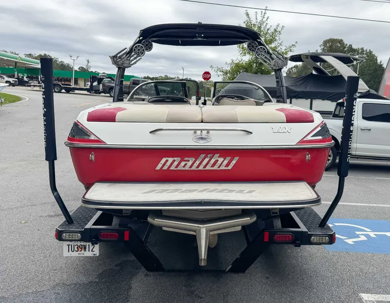 Slide: The Image of Rear view of a 2008 Malibu Wakesetter 21 VLX boat on a trailer. - 9
