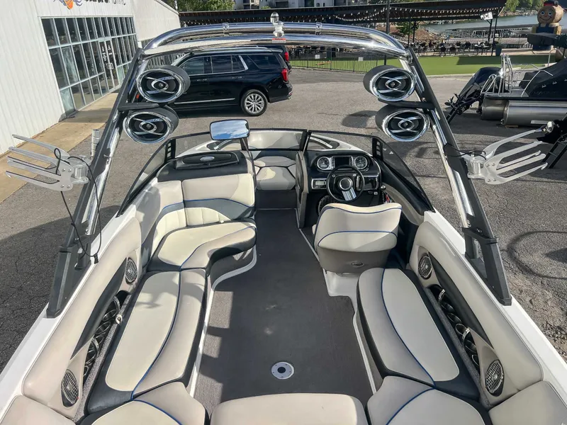 Slide: The Image of Interior of a 2011 Malibu Wakesetter 23 LSV boat with speakers. - 13