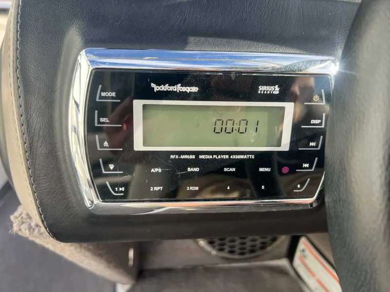 Slide: The Image of Rockford Fosgate media player in 2011 Malibu Wakesetter 23 LSV. - 20