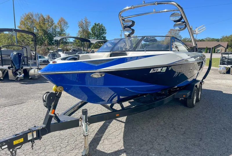 Slide: The Image of 2011 Malibu Wakesetter 23 LSV boat on trailer. - 6
