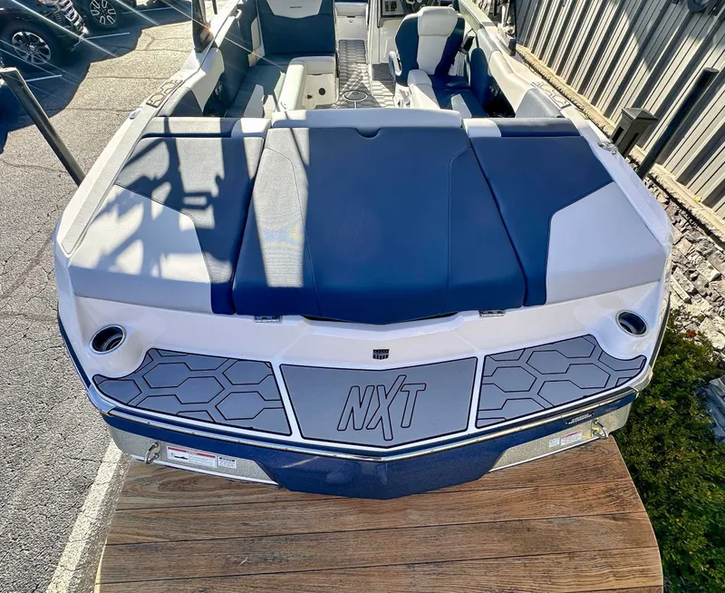 Slide: The Image of 2021 MasterCraft NXT22 boat with stylish design and comfortable seating. - 8