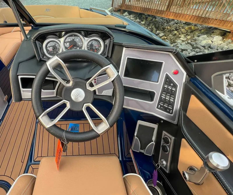 Slide: The Image of Interior view of 2021 MasterCraft XT22 boat cockpit. - 18
