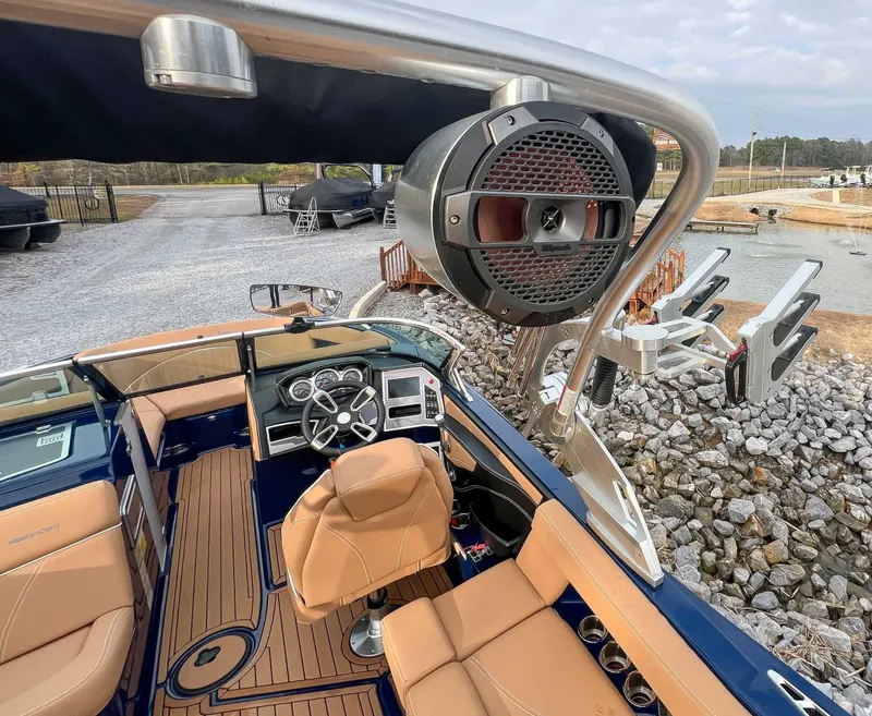 Slide: The Image of Interior of a 2021 MasterCraft XT22 boat with speakers. - 22