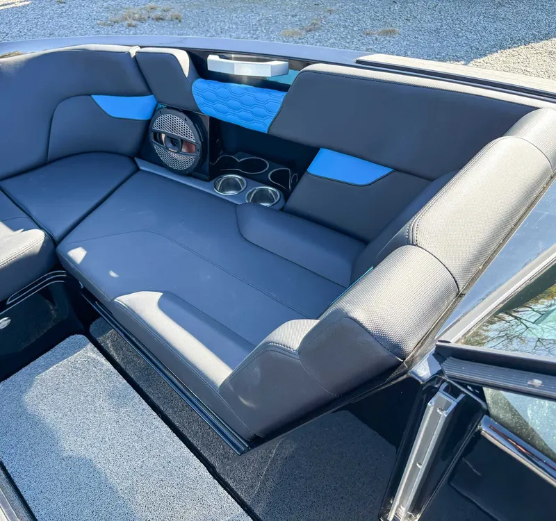 Slide: The Image of 2024 MasterCraft XT24 interior with blue accents. - 18