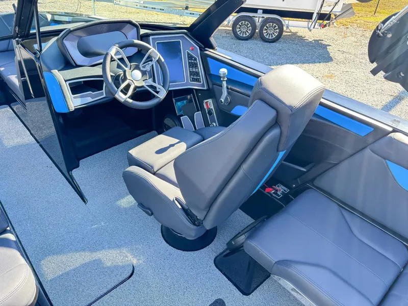 Slide: The Image of Interior of 2024 MasterCraft XT24 boat with modern helm station. - 22