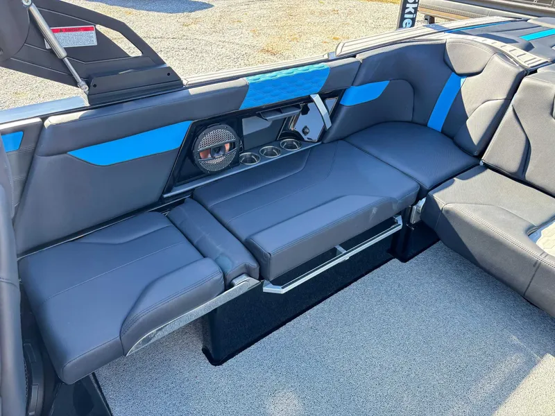 Slide: The Image of 2024 MasterCraft XT24 boat interior seating area. - 25