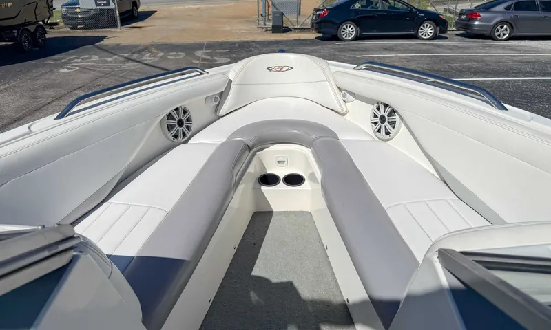 Slide: The Image of Interior of a 2002 MasterCraft X30 boat with white seating. - 12