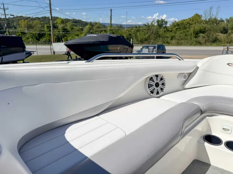 Slide: The Image of Interior of a 2002 MasterCraft X30 boat with white seating. - 13