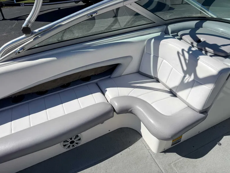 Slide: The Image of Interior of a 2002 MasterCraft X30 boat with gray seating. - 15