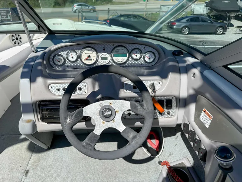 Slide: The Image of 2002 MasterCraft X30 boat steering console with dashboard. - 16