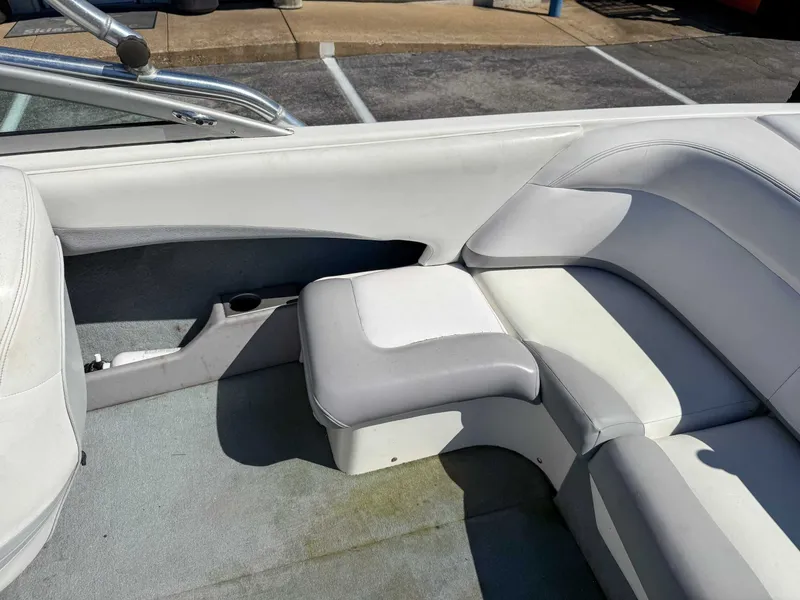 Slide: The Image of Interior of a 2002 MasterCraft X30 boat with white seating. - 17