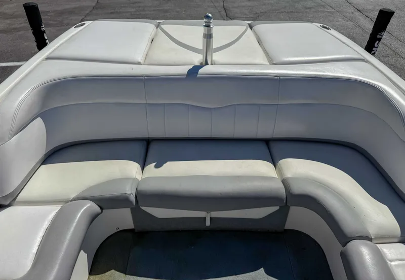 Slide: The Image of Interior of a 2002 MasterCraft X30 boat with white seating. - 18