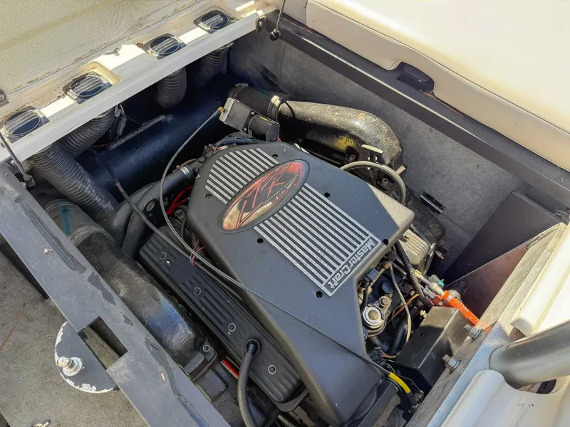 Slide: The Image of Engine compartment of a 2002 MasterCraft X30 boat. - 20