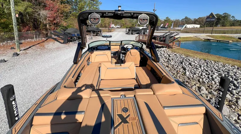 Slide: The Image of 2024 MasterCraft XStarS boat with luxurious interior. - 11