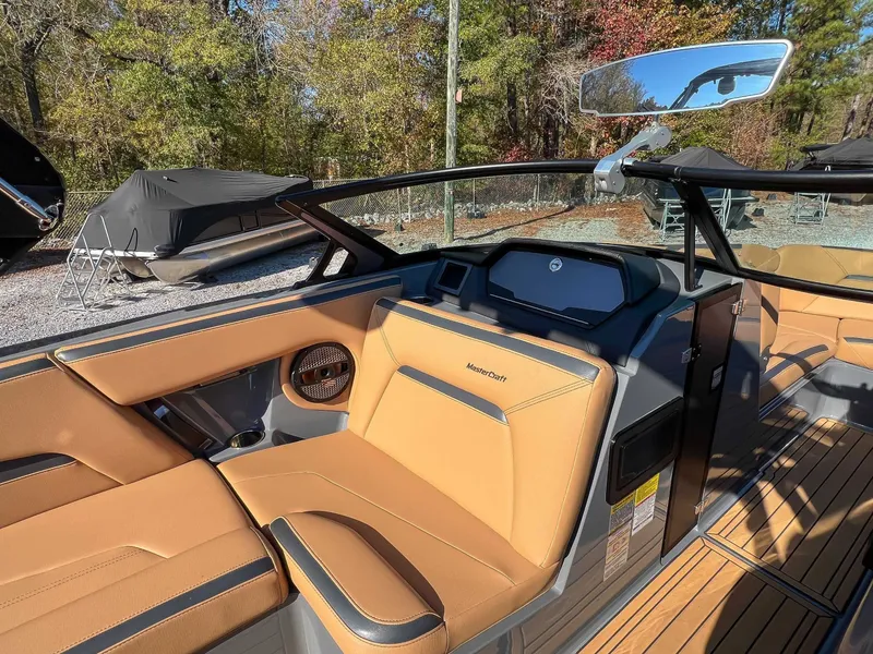 Slide: The Image of Interior of 2024 MasterCraft XStarS with luxurious leather seating. - 13