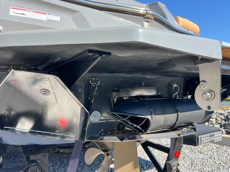 Slide: The Image of Underside of a 2024 MasterCraft XStarS boat, close-up of the mechanics. - 21