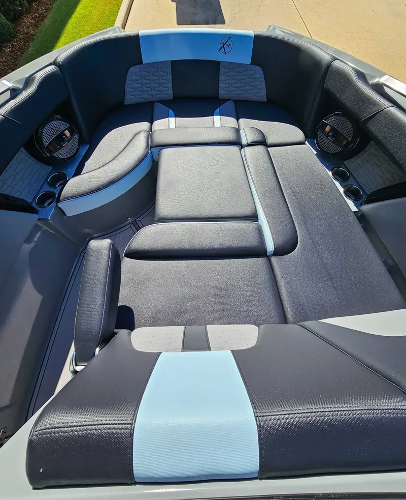 Slide: The Image of Interior of 2023 MasterCraft X26 boat, luxurious seating. - 10