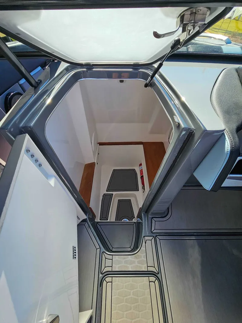 Slide: The Image of Interior of 2023 MasterCraft X26 with open door. - 13