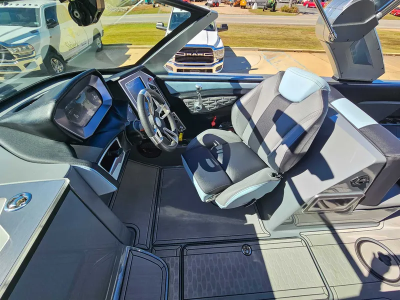 Slide: The Image of Interior of 2023 MasterCraft X26 boat with modern helm station. - 14
