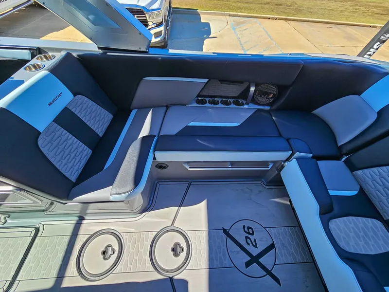 Slide: The Image of Interior of 2023 MasterCraft X26 boat with stylish seating. - 16