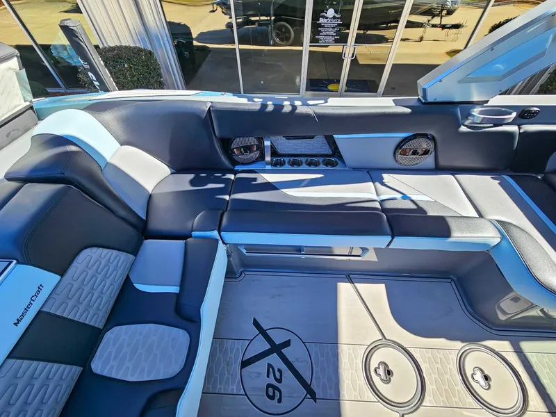 Slide: The Image of 2023 MasterCraft X26 interior with luxurious seating. - 18