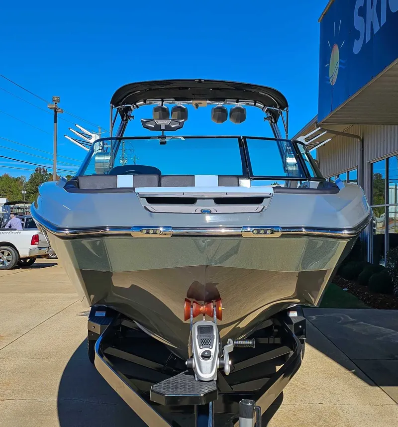 Slide: The Image of 2023 MasterCraft X26 boat, front view on a trailer. - 4