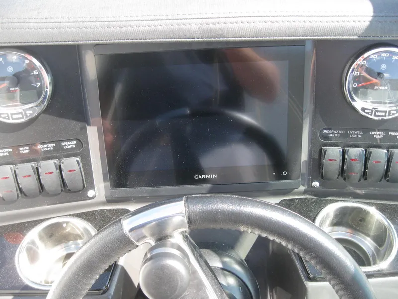 Slide: The Image of YETI cooler with cushioned seat on 2024 Blackfin 232 DC boat. - 15