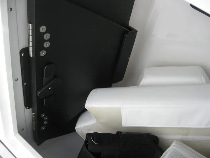 Slide: The Image of 2024 Blackfin 232 DC boat interior with compact marine toilet. - 20