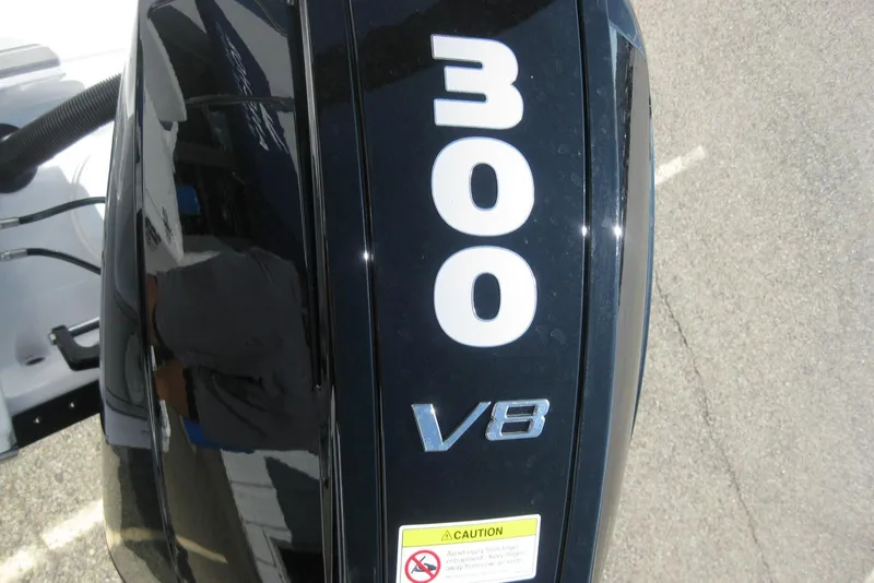 Slide: The Image of 2024 Blackfin 232 DC boat interior with speaker and storage compartment. - 26