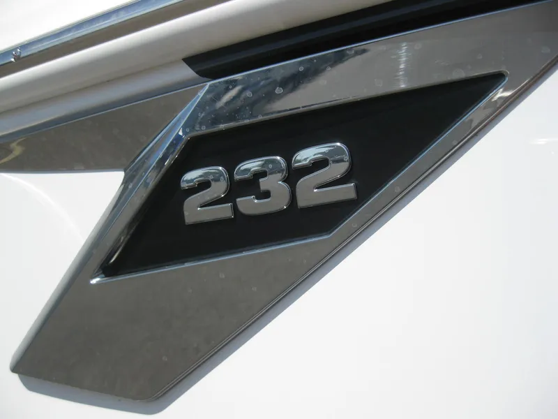 Slide: The Image of 2024 Blackfin 232 DC boat on trailer outside dealership. - 4