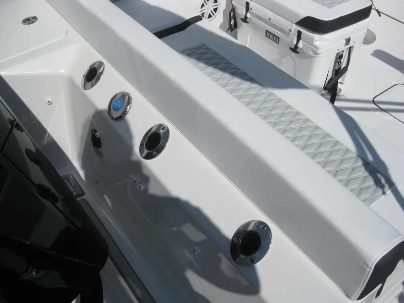 Slide: The Image of 2024 Blackfin 232 DC boat with Mercury outboard motor on trailer. - 7